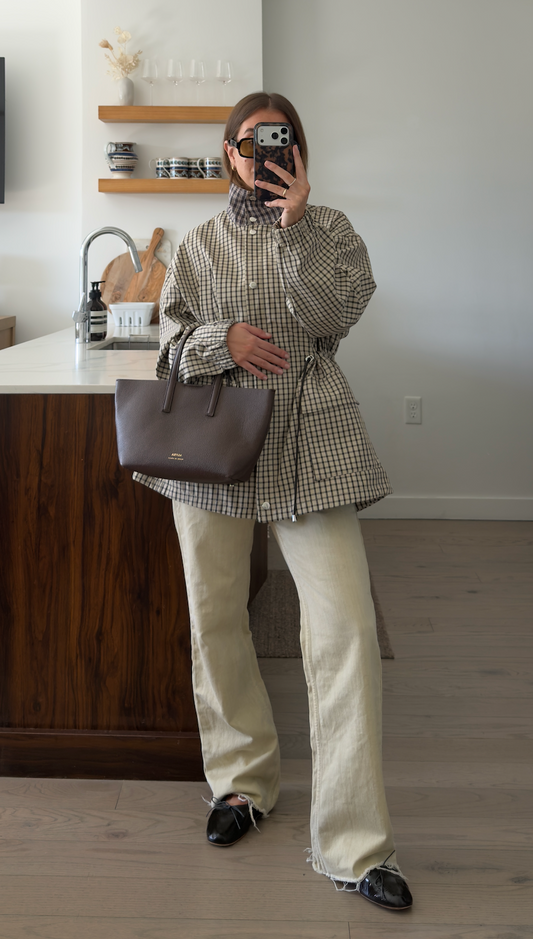 ALVEA brown mini tote styled with a checked jacket and light trousers
